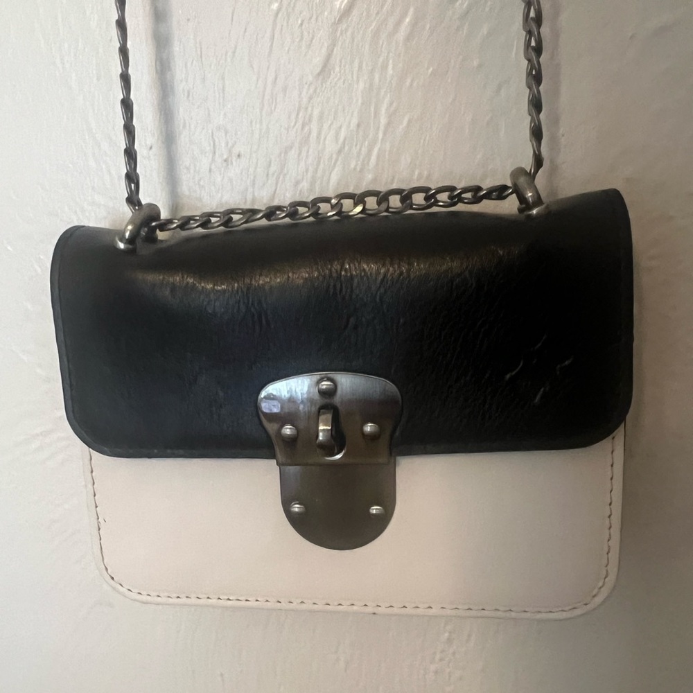 Great condition  100% leather Patricia Nash Two Toned Crossbody black and white.